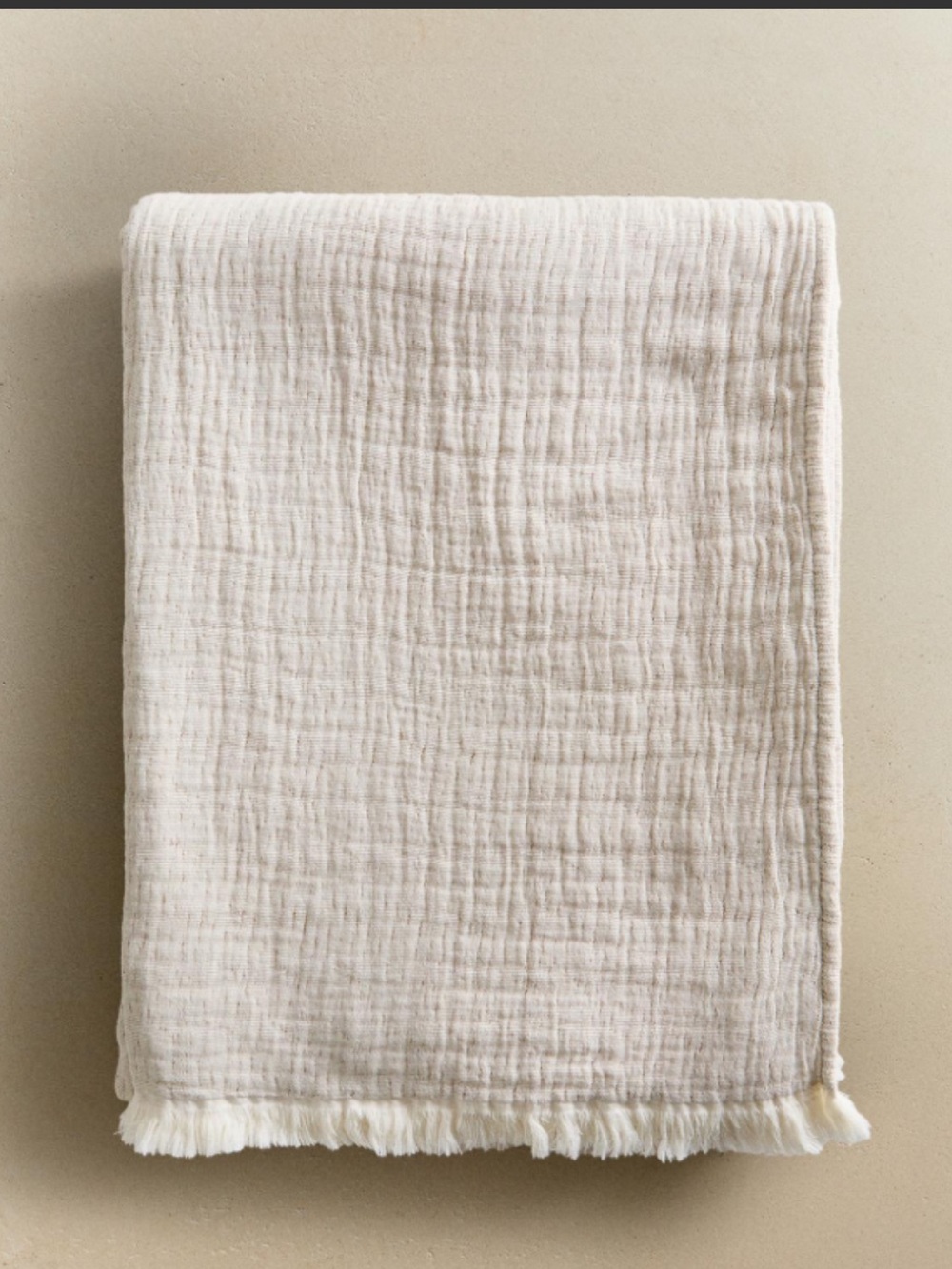 Zara oatmeal pleaded throw with fringe.